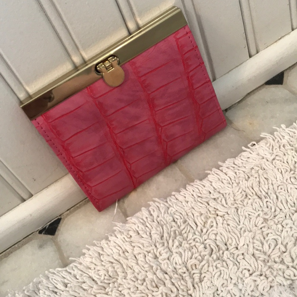 Hot pink leather three pocket clasp wallet